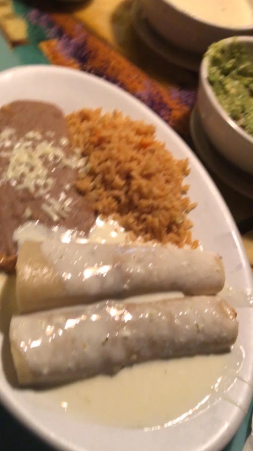 A busy Mexican restaurant with warm indoor seating.
