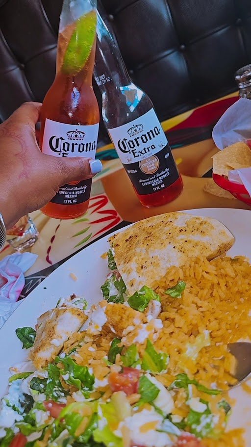 Colorful Mexican plates on a casual restaurant table.